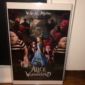 Alice in wonderland laminated movie poster